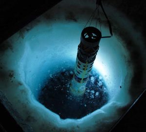 SCINI ROV diving through a hole in the ice in Antarctica