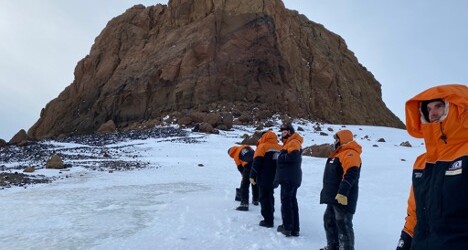 Field trainees hiking up to Castle Rock, following our trainer who cut steps in the icey snow with a shovel