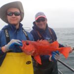 Joaquin C. and Kris H. with a Vermilion Rockfish (Sebastes miniatus) Joaquin C. and Kris H. with a vermilion rockfish on a CCFRP trip