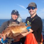 Mike J. with Jimmy W. holding a Brown Rockfish (Sebastes auriculatus) Mike J. and Jimmy W. with a brown rockfish on a CCFRP trip