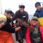 Jackie M., Bonnie B., Jen C., Katie C. and Joaquin C. with a majestic Cabezon (Scorpaenichthys marmoratus) Jackie M., Bonnie B., Jen C., Katie C. and Joaquin C. with a Cabezon on a CCFRP trip