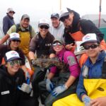 Roy Q., Jackie M., Mike C., Jen C., Captain Tom M., Katie C., Bonnie B. and Joaquin C. proudly gathered around a Cabezon (Scorpaenichthys marmoratus) Roy Q., Jackie M., Mike C., Jen C., Captain Tom M., Katie C., Bonnie B. and Joaquin C. gathered around a Cabezon on a CCFRP trip