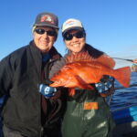 Joan B. with Jen C. holding a Copper Rockfish (Sebastes caurinus) Joan B. and Jen C. holding a copper rockfish on a CCFRP trip