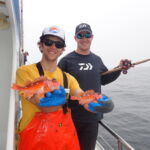 Ryan F. and Nick I. proudly showing off their twin Rosy Rockfish (Sebastes rosaceus) Ryan F. and Nick I. with two rosy rockfish on a CCFRP trip