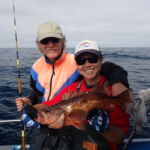 Paul R. and Jen C. with a Bocaccio Rockfish (Sebastes paucispinis) Paul R. and Jen C. holding a Bocaccio Rockfish on a CCFRP trip
