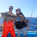 James W. and Cheyanna C. with a massive Lingcod (Ophiodon elongatus) Jimmy W. and Cheyanna C. holding a lingcod on a CCFRP trip