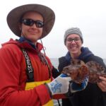 Joaquin C. and Jenny P. with a loveable Cabezon (Scorpaenichthys marmoratus)