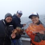Captain Allen C., Lester Y. and Laurel L. with a Quillback Rockfish (Sebastes maliger) and a Copper Rockfish (Sebastes caurinus) Captain Allen C, Lester Y., and Laurel L. with a quillback and copper rockfish