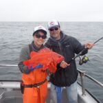 Laurel L. and Lester Y. with a brightly-colored Vermilion Rockfish (Sebastes miniatus) Laurel L. and Lester Y. with a Vermilion Rockfish caught on a CCFRP trip