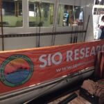 SIO research banner on the side of the fishing vessel to indicate scientific research is being conducted SIO research banner on the side of the fishing vessel to indicate scientific research is being conducted