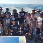 Volunteer anglers and crew aboard the F/V Sum Fun after a great day of catch and release fishing Volunteer anglers and crew aboard the F/V Sum Fun after a great day of catch and release fishing