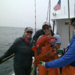 Megan W. and Rose D. show off Debbie H's pair of Vermilion Rockfish (Sebastes miniatus) caught and released in the Piedras Blancas MPA Megan W. and Rose D. show off a volunteer angler's pair of Vermilion Rockfish (Sebastes miniatus) caught and released in the Piedras Blancas MPA