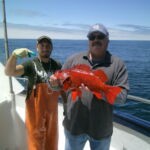 Wyatt P. and Lyndon M. with a tagged Vermilion Rockfish (Sebastes miniatus) Wyatt P. and Lyndon M. with a tagged Vermilion Rockfish (Sebastes miniatus) caught on a CCFRP trip