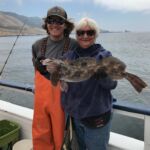 Matt M. and Marcy D. with a Lingcod (Ophiodon elongatus) Matt M. and Marcy D. with a Lingcod (Ophiodon elongatus) caught on a CCFRP trip