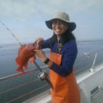 Rosemary K. with a Vermilion Rockfish (Sebastes miniatus) Rosemary K. with a Vermilion Rockfish (Sebastes miniatus)