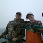 Rose D., Matt M., and a volunteer angler with a Lingcod (Ophiodon elongatus) Rose D., Matt M., and a volunteer angler with a Lingcod (Ophiodon elongatus)