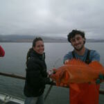 Zach K. and April B. with a Vermilion Rockfish (Sebastes miniatus) Zach K. and April B. with a Vermilion Rockfish
