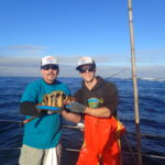 Eddie G. with Ryan F. hanging out with a Treefish (Sebastes serriceps) Eddie G. and Ryan F. with a Treefish on a CCFRP trip