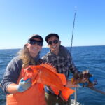 Bonnie B. and Michael H. showcasing a Vermillion Rockfish (Sebastes miniatus) and a Gopher rockfish (Sebastes carnatus)