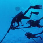 Divers attaching MOBY tether to the mooring line