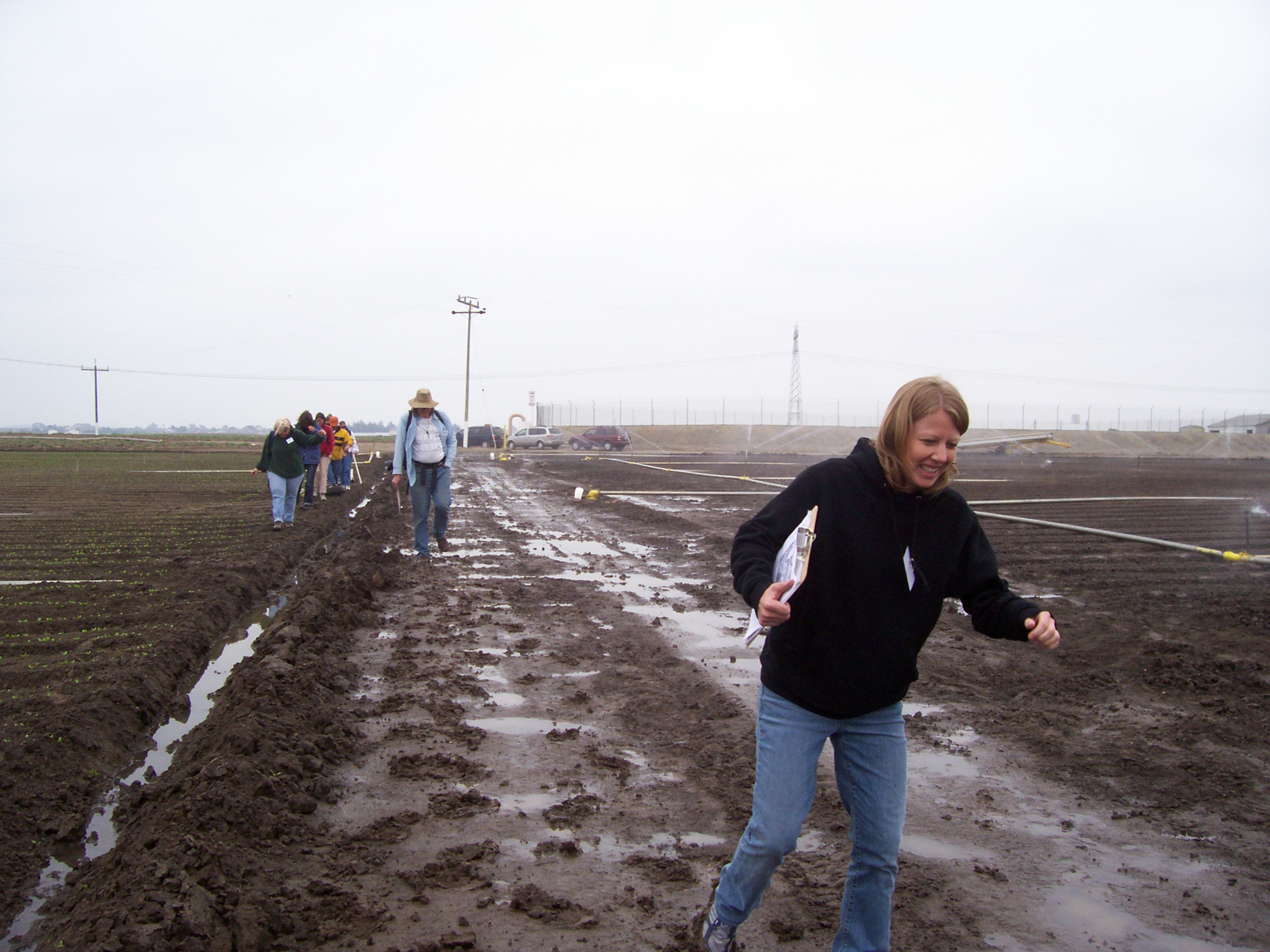 Slogging through mud on a quest to sample water quality