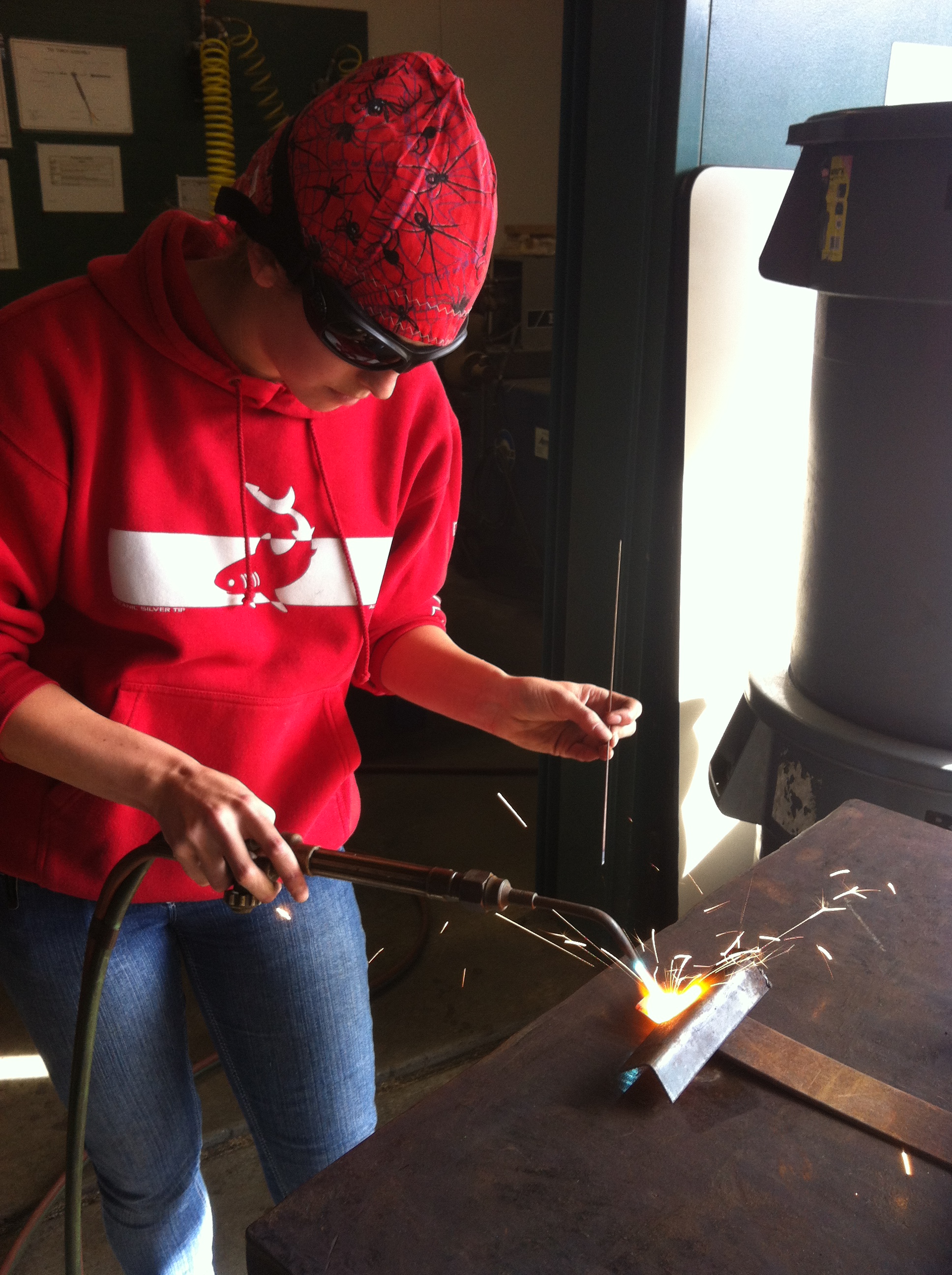 Kristin Walowich practices oxyacetylene welding. Photo by: Catherine Drake.