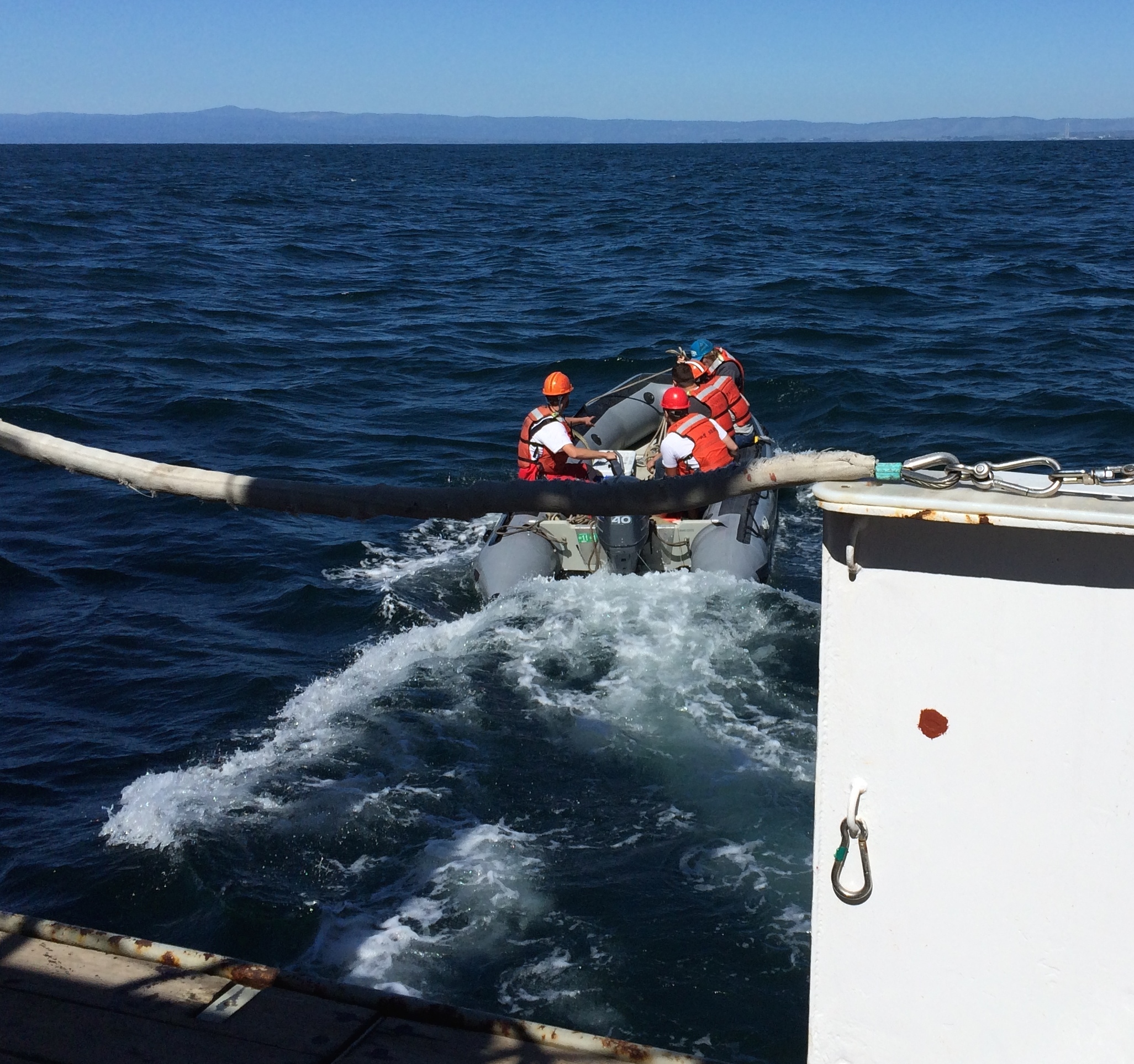 Launching a small boat from the Point Sur!