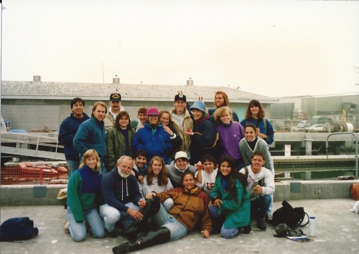 Figure 6. Fall 1993 Ecology Class cruise aboard R/V Point Sur (posing on dock). Pictured: Back Row, left to right: Jon Kao, unknown, Dr. Andrew DeVogelaere, unknown, unknown, Jonna Engel, Elaine Herr, Dave Lindquist, Michelle White, Sean McDermott, Lisa Kerr Lobel, Erica Burton, unknown; Front Row, left to right: Kit Muhs, Dr. Gregor Cailliet, Noel Cristimoto (?), Barbie Byrd, Korie Johnson Schaeffer, Rebecca Reuter, Eli Landrau Woodvine, Leigh Nerney, and Bill Leopold.