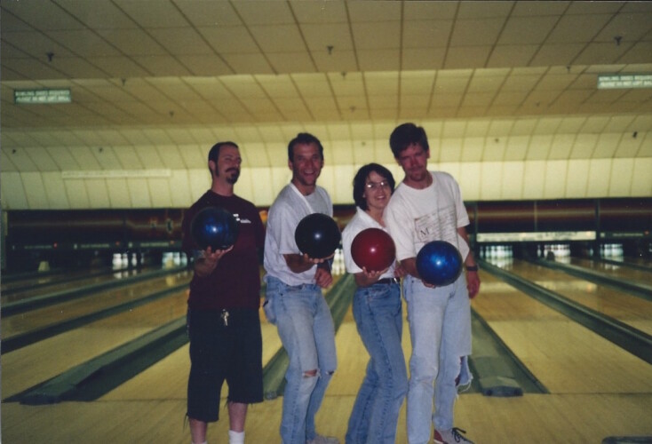 Figure 12. Team B.U.I. at 1997 Bowling Tournament. Pictured left to right: Pat Iampietro, Matt Edwards (with arm in sling; what a trouper!), Erica Burton, and Stewart Lamerdin.